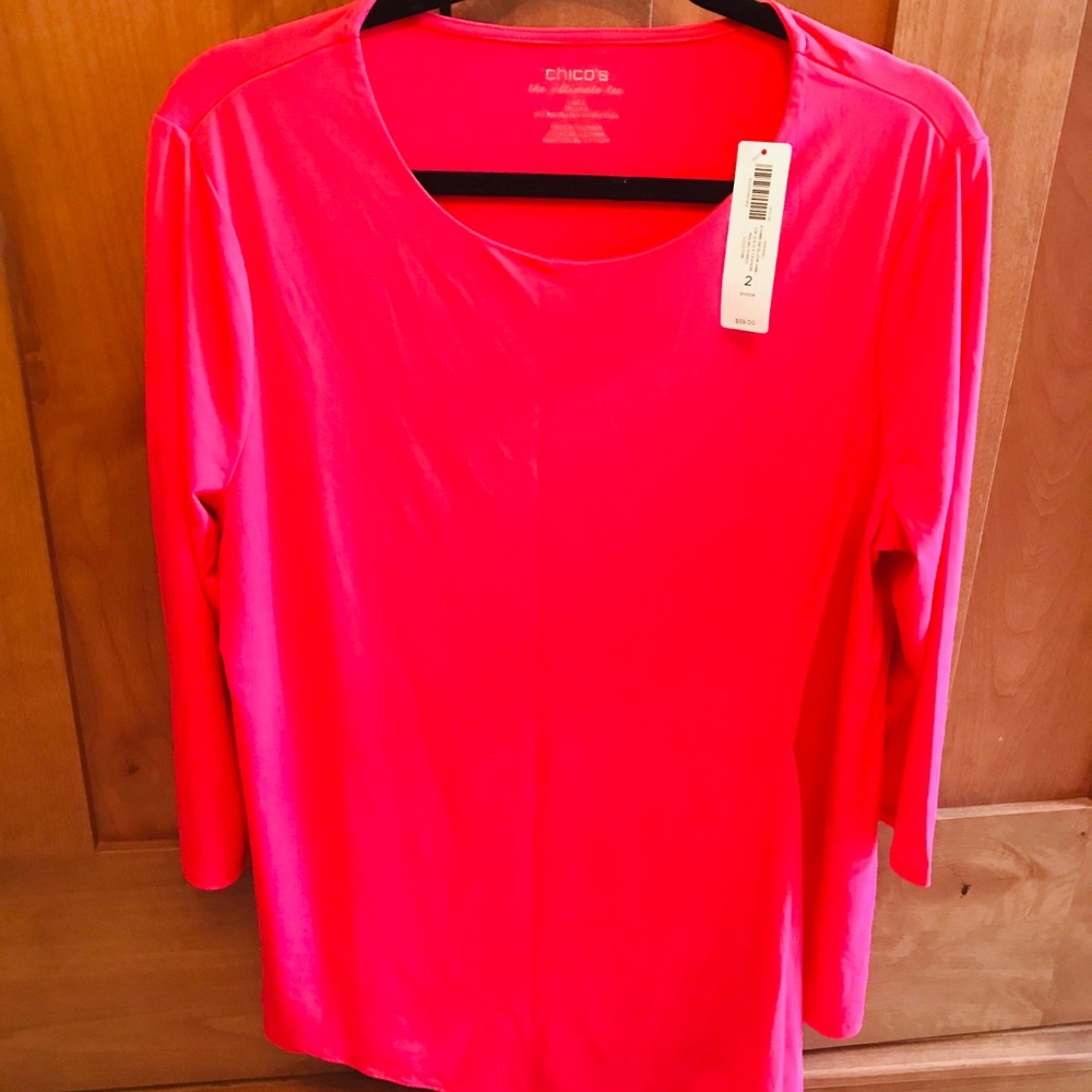 Beautiful coral asymmetrical hem tunic.